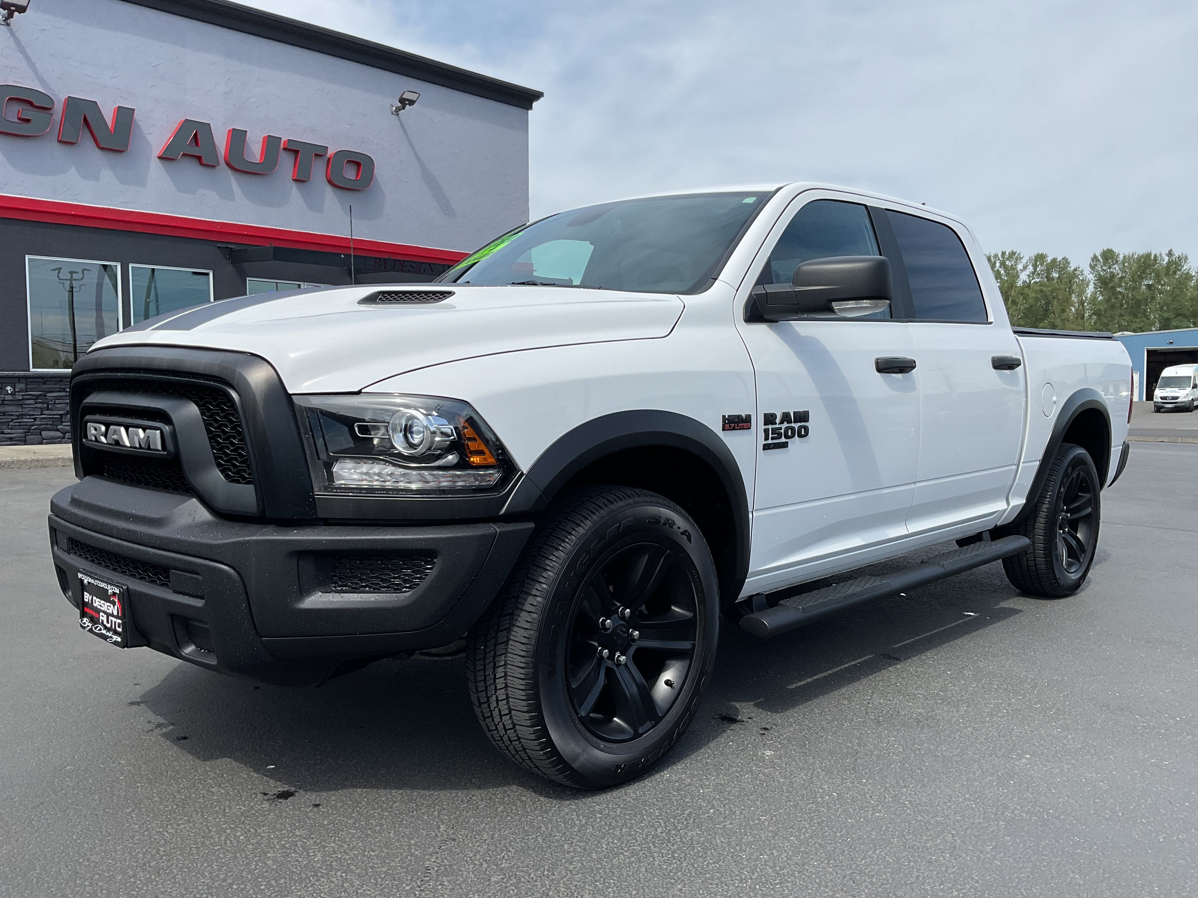 2021 RAM 1500 Classic Warlock Crew Cab HEMI 4x4 in Bright White Clearcoat — front three-quarter view
