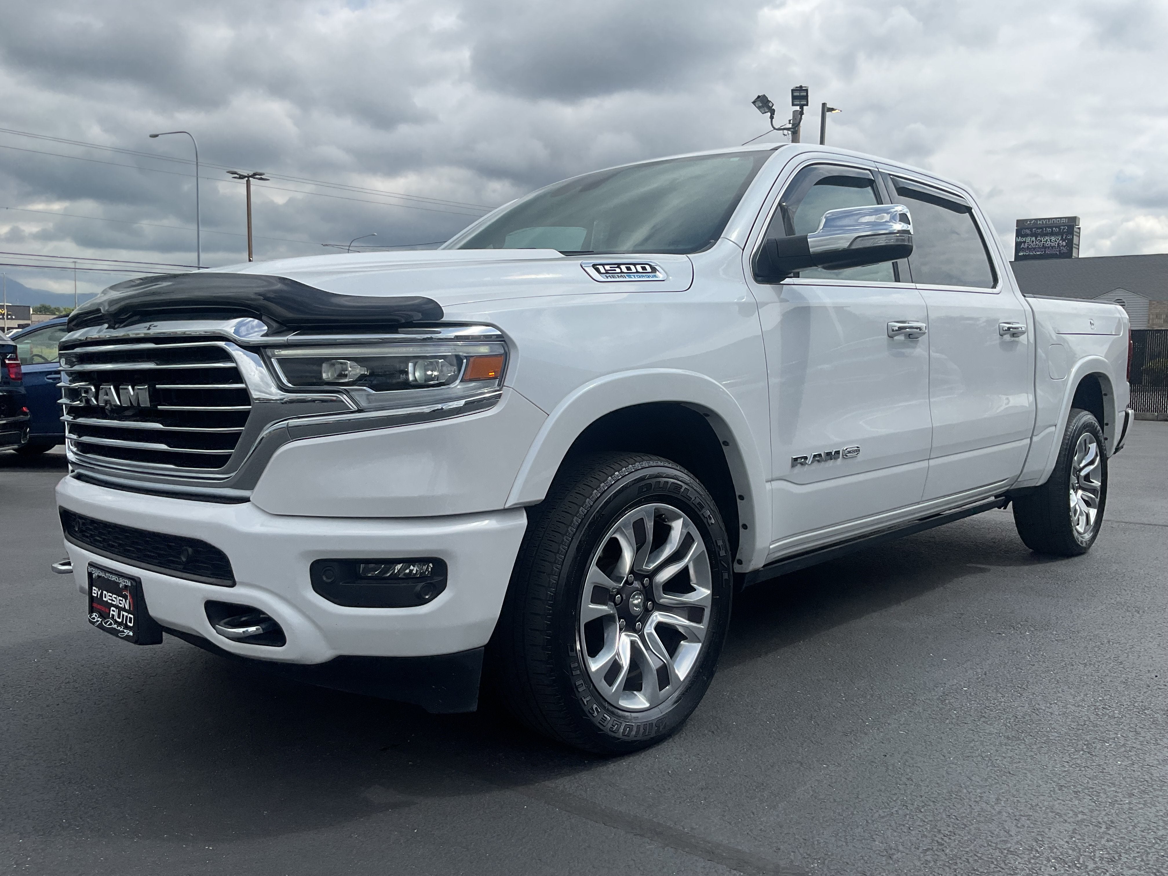 2022 RAM 1500 Limited Longhorn 4x4 in Ivory White Tri-Coat Pearlcoat — front three-quarter view