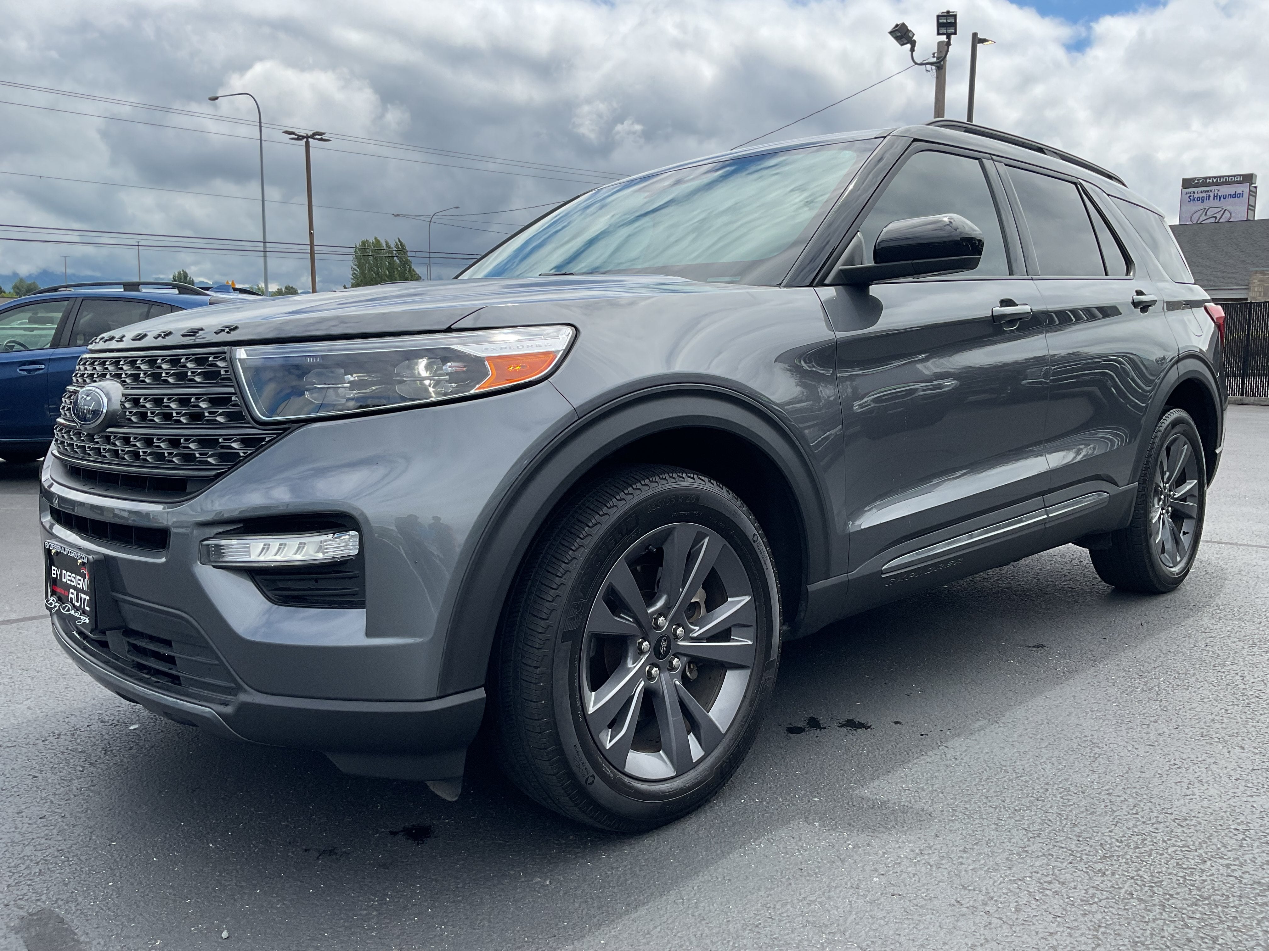 2023 Ford Explorer XLT 202A Sport 4x4 in Carbonized Grey Metallic — front three-quarter view