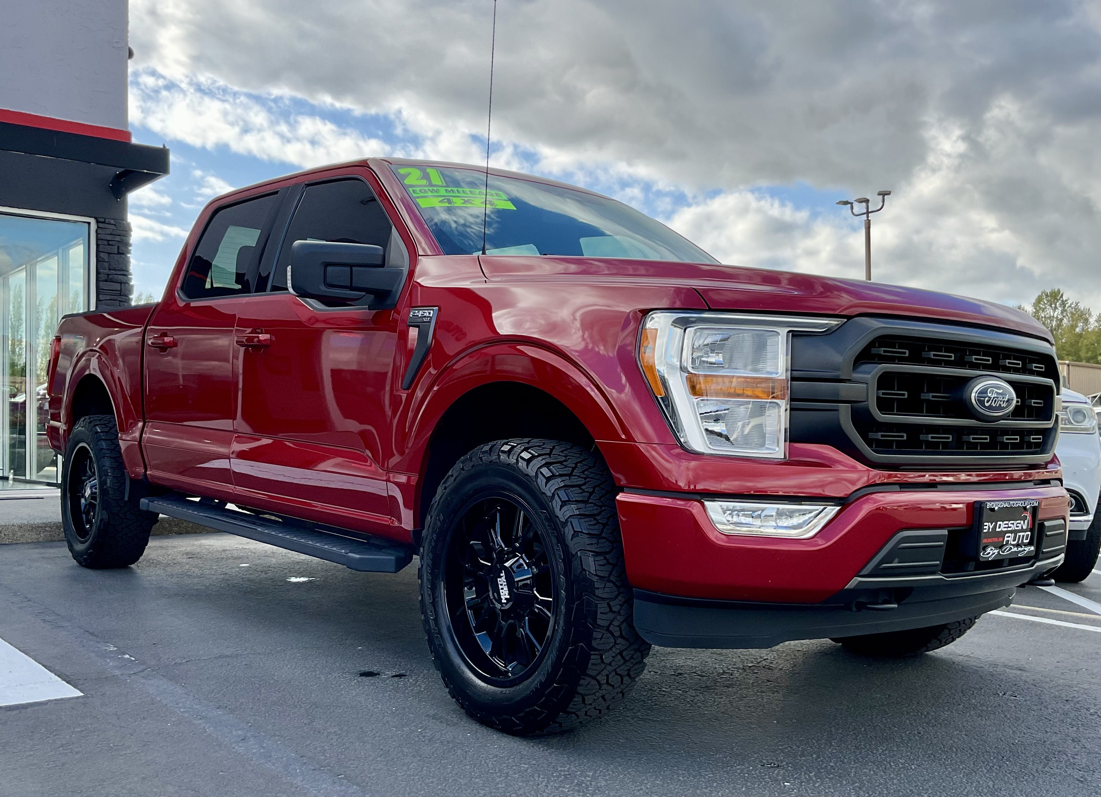 2021 Ford F-150 FX4 Crew Cab 4x4 in Race Red — front three-quarter view