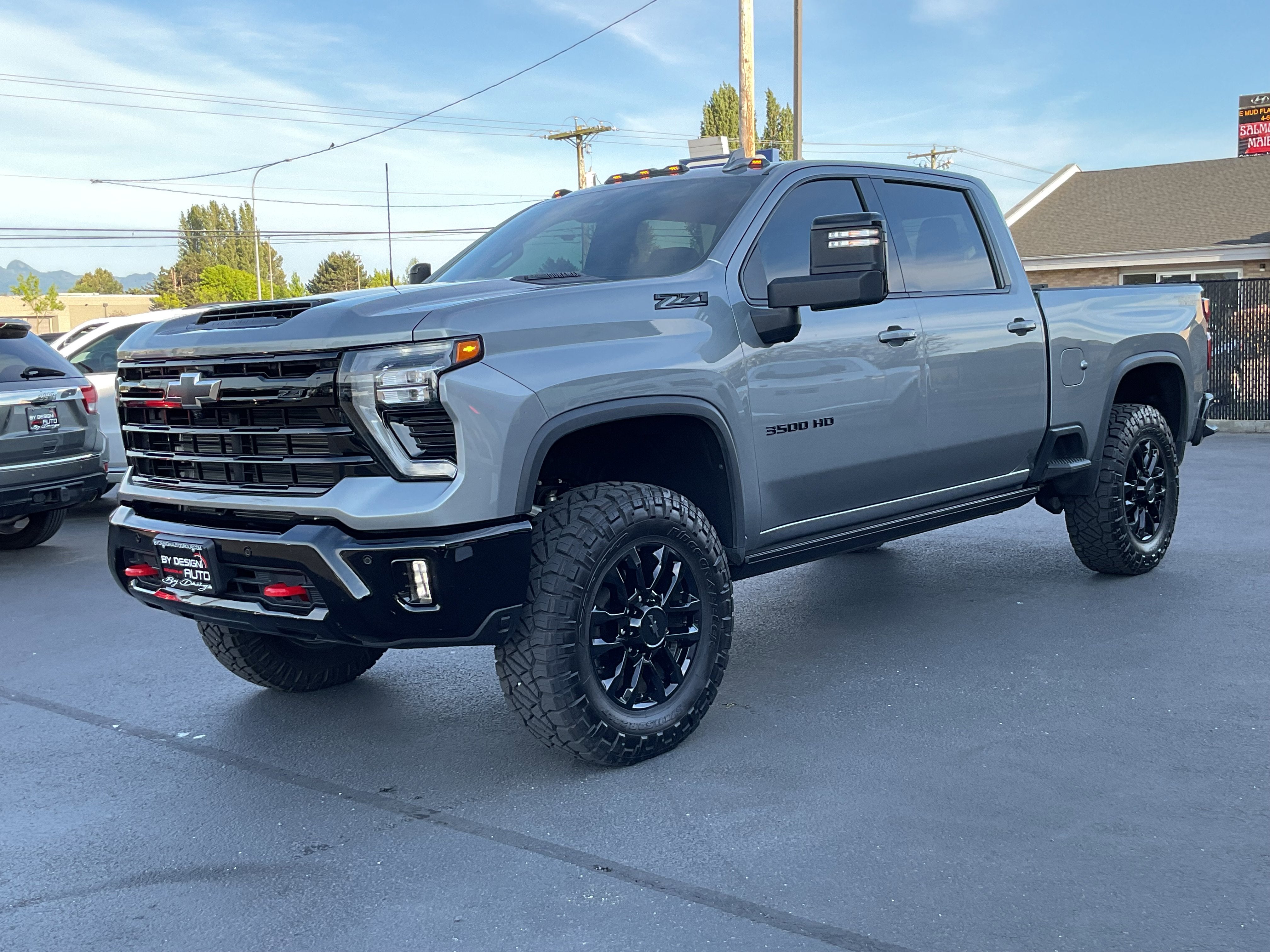 2025 Chevrolet Silverado 3500HD LTZ Trail Boss Duramax Diesel 4x4 in Sterling Gray Metallic — front three-quarter view