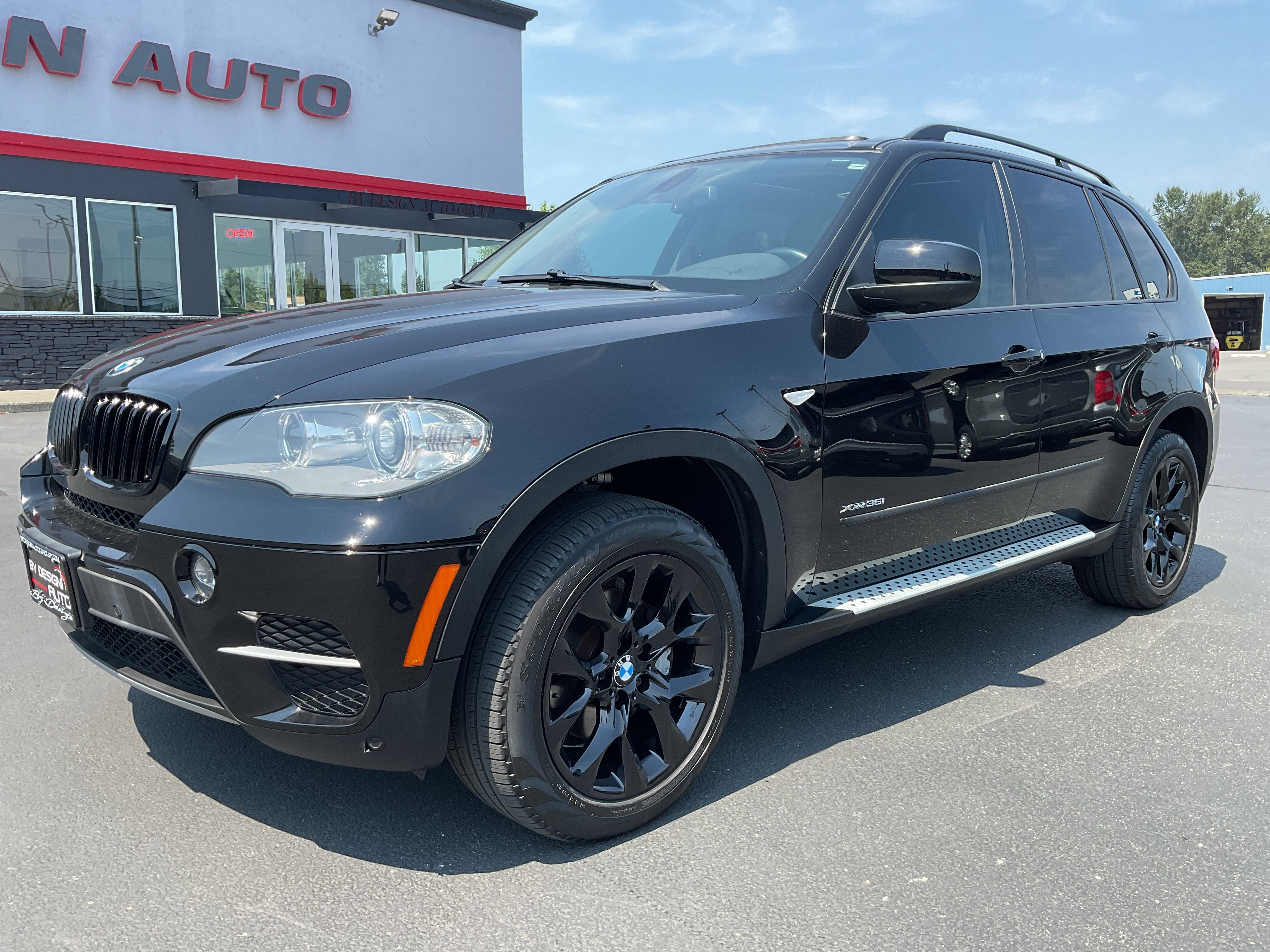 2013 BMW X5 xDrive35i AWD in Black — front three-quarter view