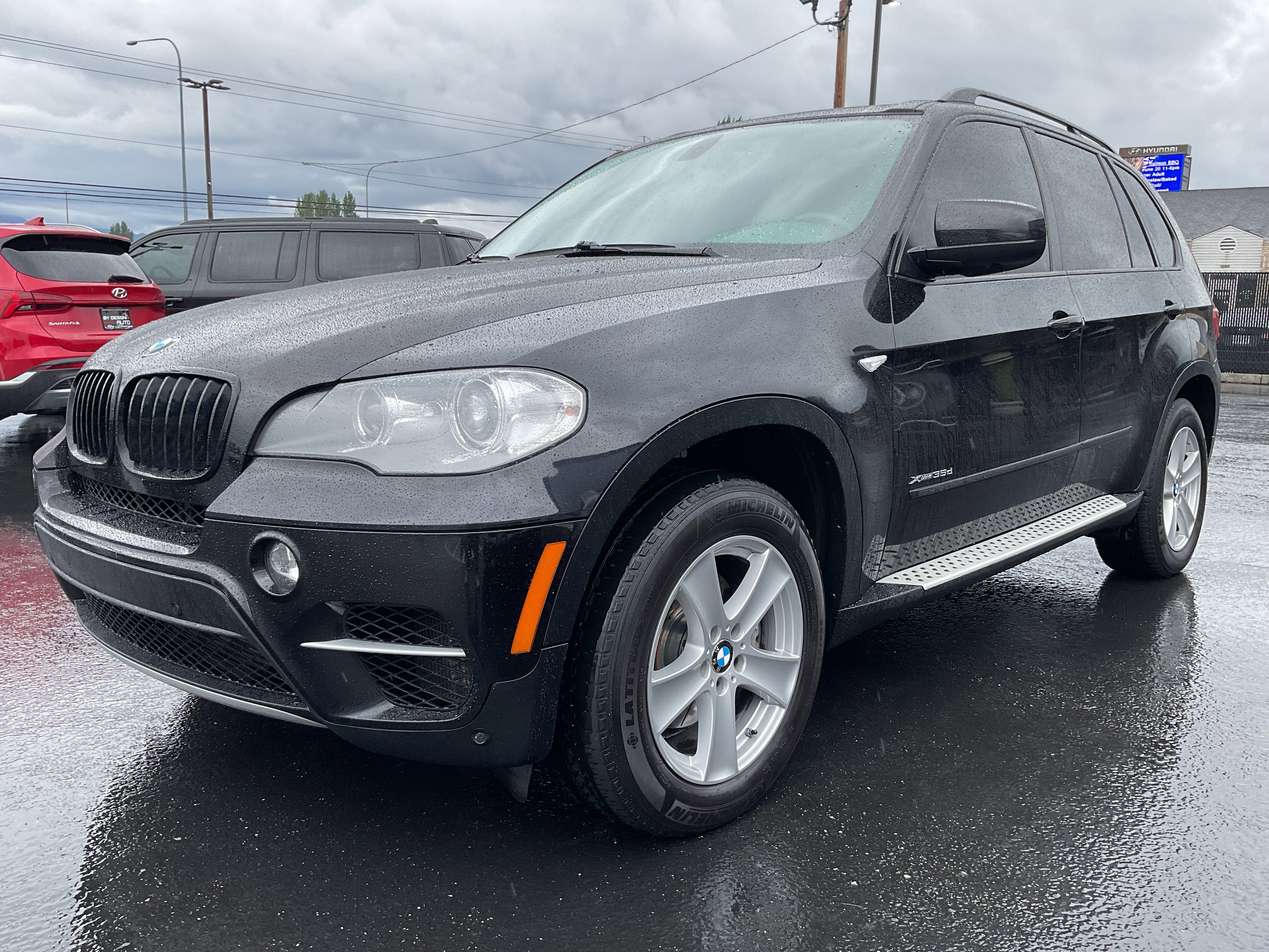 2012 BMW X5 35d AWD in Black — front three-quarter view