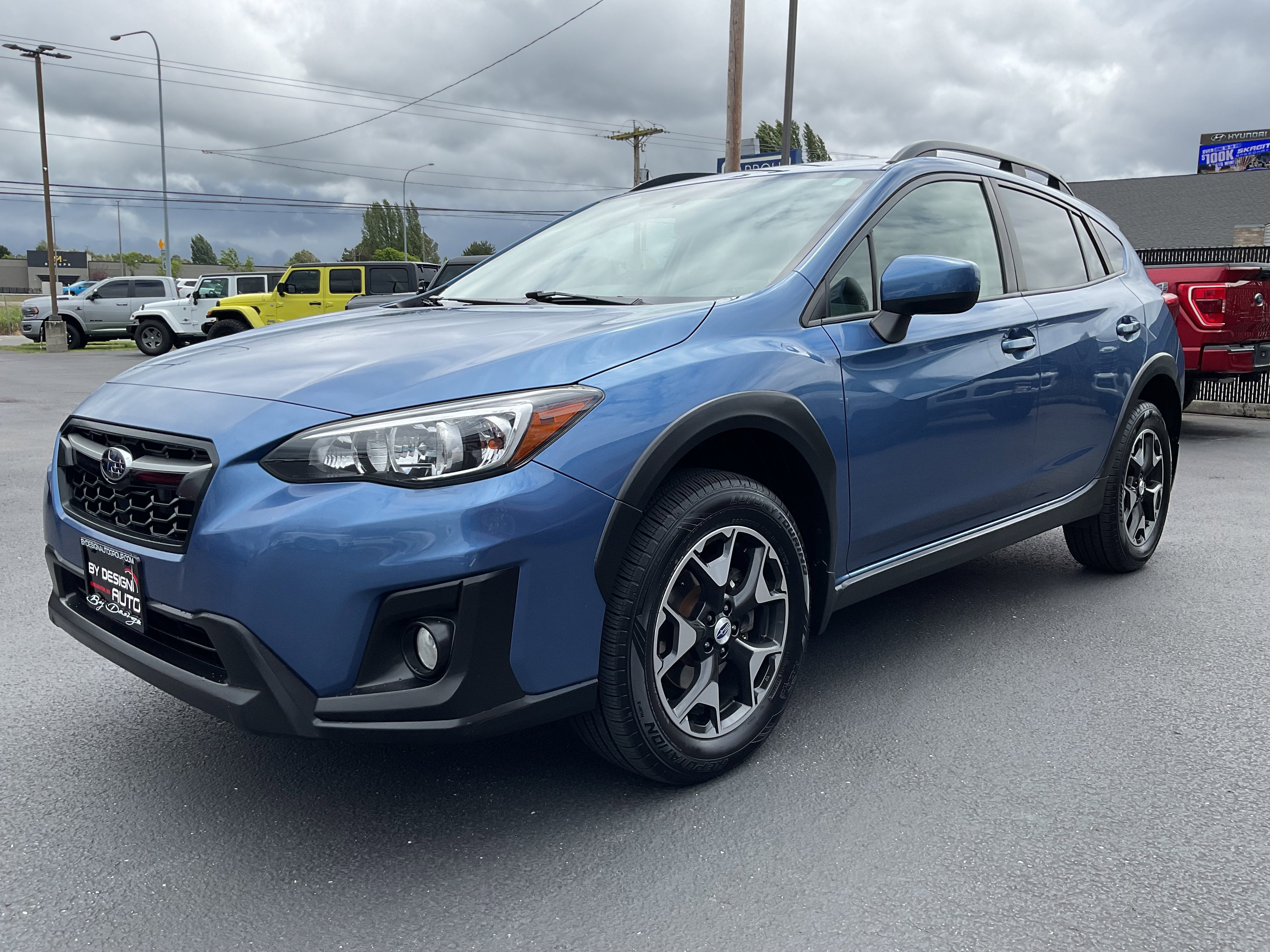 2018 Subaru Crosstrek Premium w/ Leather AWD in Quartz Blue Pearl — front three-quarter view