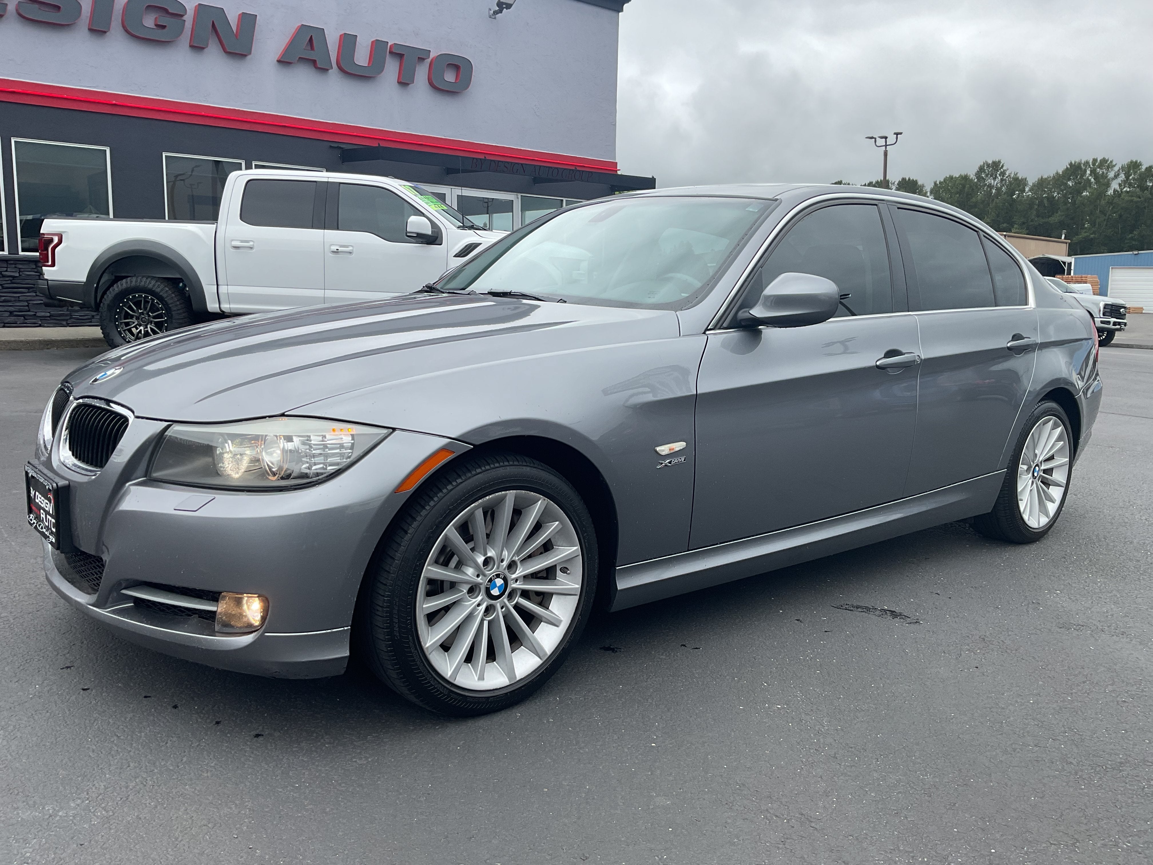 2011 BMW 3 Series 335i xDrive AWD in Gray — front three-quarter view